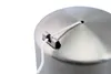 A close-up view of the top of a silver cylindrical object, likely a Kordelbox, with a white cord emerging from a small hole and secured by a metal clip. Produktbild-Vorschau