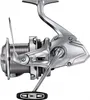 A silver fishing reel is shown against a white background. Voir les images du produit