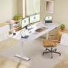 A modern home office setup with a standing desk and multiple monitors. Náhled obrázku produktu