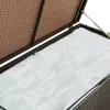 A close-up view of the inside of an open storage box, showing the white liner and the brown woven exterior. Podgląd zdjęcia produktu