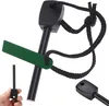 A fire starter tool with a green striker, shown with a hand holding a smaller version of the tool. Produktbild-Vorschau