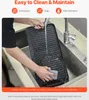 A person is washing a cast iron griddle in a sink. Anteprima dell’immagine prodotto
