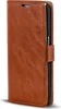A brown leather wallet case for a smartphone, shown closed and standing upright. Produktbild-Vorschau