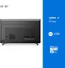The back of a black television is shown, with text overlays detailing its features. Produktbild-Vorschau