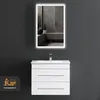 A modern white bathroom vanity with a sink and a backlit mirror above it, mounted on a dark gray wall. Produktbild-Vorschau
