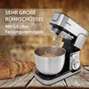A kitchen mixer with a bowl of dough and sliced bread on a wooden table. Produktbild-Vorschau