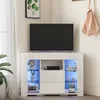 A modern white media console with a television on top and LED lighting inside. Voir les images du produit