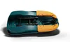 A teal and orange plastic sled with steering wheel, shown from an overhead angle on a white background. Produktbild-Vorschau