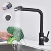 A black kitchen faucet is shown rinsing a head of broccoli in a sink. Inset images show the faucet's spray head and a detachable aerator. Produktbild-Vorschau
