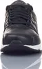 A front view of a black Nike sneaker. Voir les images du produit