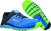A pair of blue and black athletic shoes with a bright green and blue sole, shown from a slightly elevated diagonal angle. The sole of a second shoe is shown separately in the background. Voir les images du produit