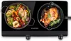 A black Klarstein induction cooktop with two cooking zones, each displaying food being cooked. Náhľad obrázku produktu