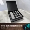 A gift set of whisky stones in a black box, with text overlay. Produktbild-Vorschau