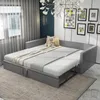 A grey sofa bed is shown in a room with curtains and wall art. Produktbild-Vorschau