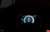 A close-up view of a digital car dashboard display showing speed, battery level, and driving mode. Náhľad obrázku produktu