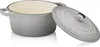 A gray cast iron pot with a beige interior and a lid resting beside it. Anteprima dell’immagine prodotto