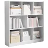 A white, multi-compartment bookshelf filled with various items. Podgląd zdjęcia produktu