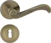 A door handle set with a round rosette, shown against a white background. Produktbild-Vorschau