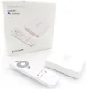A white Homatics Box R Lite 4K Android TV device and its remote control are displayed on a white background, with the product's packaging box also visible. Produktbild-Vorschau