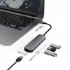 A USB hub is connected to a laptop, with USB drives shown nearby. Produktbild-Vorschau
