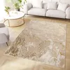 A modern living room with a sofa, coffee table, and a rug. Anteprima dell’immagine prodotto