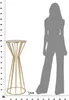A silhouette of a person stands next to a gold side table, with a ruler graphic indicating measurements. Produktbild-Vorschau