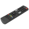 A black remote control is shown from a diagonal angle against a white background. Voir les images du produit