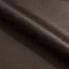 A close-up view of brown fabric, with folds and shadows suggesting it's a piece of upholstery or textile. Podgląd zdjęcia produktu