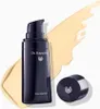A bottle of Dr. Hauschka foundation with a swatch of foundation next to it and the cap off to the side. Voir les images du produit