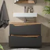 A modern bathroom vanity with a sink and storage drawers. Náhled obrázku produktu