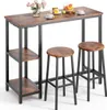 A bar table with two stools and some decorative items on the table. Podgląd zdjęcia produktu