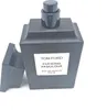 A black Tom Ford Fucking Fabulous Eau de Parfum bottle with the cap off. Náhľad obrázku produktu