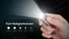 A hand holding a small flashlight, with text and icons indicating different brightness levels. Podgląd zdjęcia produktu