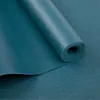 A close-up, rolled-up view of a teal yoga mat. Produktbild-Vorschau