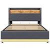 A bed frame with a headboard and wooden accents, shown from the front. Produktbild-Vorschau