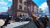 A first-person perspective of a video game scene, showing soldiers in combat in a European-style city. Produktbild-Vorschau