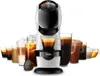 A coffee machine with various coffee drinks displayed in glasses behind it. Produktbild-Vorschau