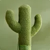 A close-up shot of a green cactus-shaped cat scratching post against a plain green background. Produktbild-Vorschau