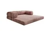 A rose-colored sofa with a chaise lounge section, shown from a side angle against a white background. Produktbild-Vorschau