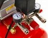 Close-up view of an air compressor's pressure gauges and regulator. Náhľad obrázku produktu