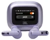 A close-up front view of a pair of purple JBL wireless earbuds and their charging case, which has a small screen displaying equalizer settings.
