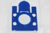 A close-up, top-down view of a blue plastic vacuum cleaner bag adapter with a white filter disk. Produktbild-Vorschau