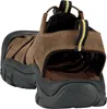 A single brown sandal is shown from the back, with the sole and straps visible. Produktbild-Vorschau