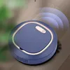 A blue robot vacuum cleaner on a wooden floor with green foliage in the background and a graphic showing sensor waves emanating from the device. Náhled obrázku produktu