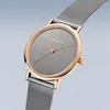 A close-up studio shot of a Bering women's wristwatch with a gray dial and rose gold accents, set against a light gray background. Náhled obrázku produktu