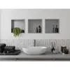 A modern bathroom vanity with a sink, faucet, and decorative items. Náhled obrázku produktu