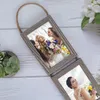 A decorative hanging collage frame with two photos of women in wedding attire, set against a white wooden background with a succulent plant and white flowers. Produktbild-Vorschau