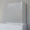 A shower screen for a bathtub against a textured gray wall. Produktbild-Vorschau