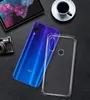 A smartphone and its transparent case are displayed on a dark surface, alongside a tablet and a cup of coffee. Produktbild-Vorschau