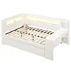 A white bed frame with integrated shelving and LED lighting. Produktbild-Vorschau